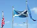 The Union Jack, Flag of Scotland and Flag of Europe at the Scottish Parliament Building