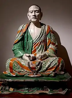 Statue of the luohan Tamrabhadra, one of the group of glazed pottery luohans from Yixian; 10th–13th century; glazed terracotta; height: 123&nbsp;cm; Guimet Museum (Paris)