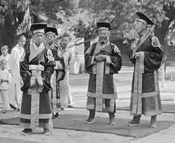 Men in ceremonial garments at Confucian Temple of Beijing, 1924 to 1927.