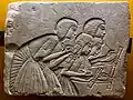Scribes with pens and papyrus scrolls. Relief from Amarna