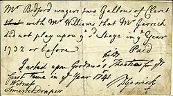 Image of a document in 18th century handwriting that shows at least two sets of handwriting, including David Garrick's signature