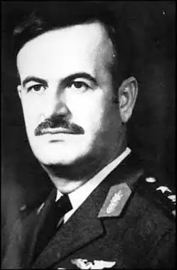 Mustachioed man in military uniform