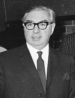 Black-and-white head shot of Brown