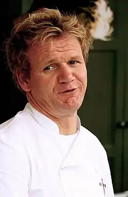 Headshot of Gordon Ramsay. He is a middle-aged, white man with blond hair.