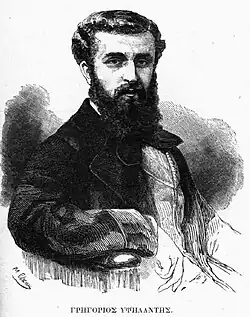 Black-and-white portrait of a bearded man