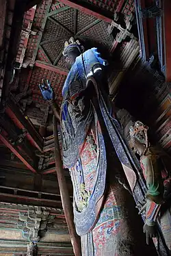 Liao dynasty statue of the Eleven Headed Guanyin in Dule Temple in Tianjin, China.