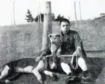 Young man with three dogs