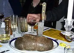 Oatmeal is a prime ingredient of haggis, seen here at a Burns supper.