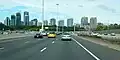 Highway 401 looking east between Avenue Road and Yonge Street; the North York skyline is visible in the distance.