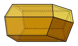A computer-generated model of a honeycomb cell, showing a hexagonal tube terminating in three equal rhombuses that meet at a point on the axis of the cell