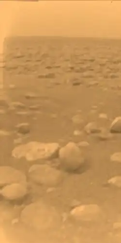 Pebbles on Titan's surface, photographed from a height of about 85&nbsp;cm by the Huygens spacecraft