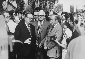 House minority leader Rhodes, Senate minority leader Scott, and Senator Goldwater at a press conference after meeting with Nixon