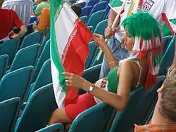 Football fan holding the Islamic flag