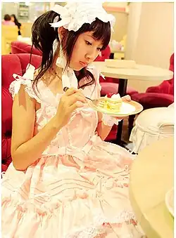 Japanese girl eating a piece of cake