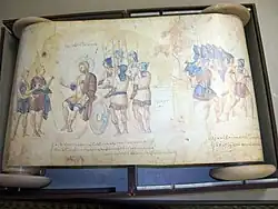 A photograph of an illustrated manuscript written in Greek. At the left are two people who are standing talking to a person who is seated, while 5 soldiers listen. At the right are a group of soldiers going somewhere.