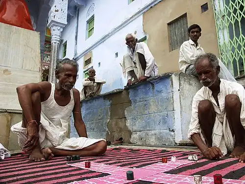 A street-corner game of pachisi in Pushkar, Rajasthan