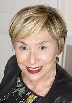 Photo of a woman with short, blond hair