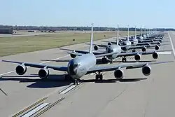 The front of several gray aircraft are centered in the image.