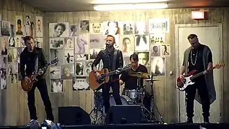 Kent performing in Sundsvall in 2012. From left to right: Sami Sirviö, Joakim Berg, Markus Mustonen and Martin Sköld