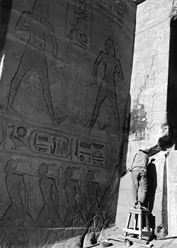 Workers adding the last touches to mask the joints made during the cutting of the temple, September 1968.