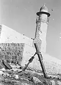 Palmach 3 inch mortar in front of Lydda mosque. 1948