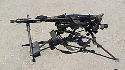 Tripod mounted with 4× optical sight