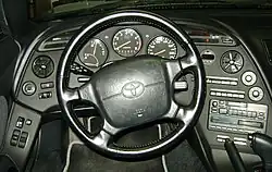 Interior, with a four-spoke steering wheel (US; pre-facelift)