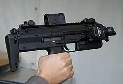 An MP7A1 with Zeiss RSA reflex red dot sight and LLM01 laser light module.