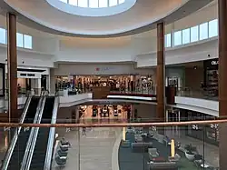 Entrances to a two-story Macy's store (seen 2017) inside The Mall at University Town Center in Sarasota, Florida, originally built in 2014