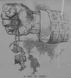 A political cartoon. A closed fist protrudes from a jacket-sleeve covered in dollar signs; a cuff-link is marked "MARK $ HANNA". The hand tightly grasps a chain from which hangs a tiny, sorry-looking figure marked "McKinley". "A Man of Mark!" concludes the cartoon's caption.