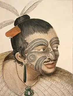 portrait of a Maori man, with a facial tattoo