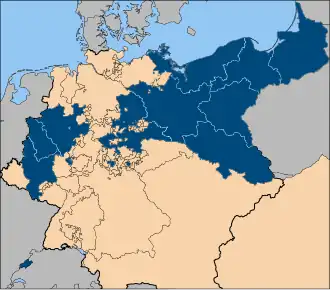 The ten provinces of the Kingdom of Prussia, after the Congress of Vienna. The other member states of the German Confederation are shown in beige. The Canton of Neuchâtel in the south-west was under Prussian administration until 1848.