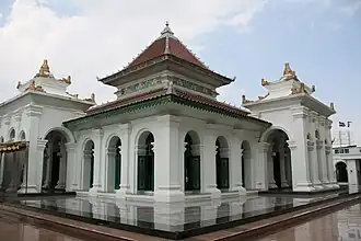 The Great Mosque of Palembang in Palembang, Sumatra built in 1738, together with other post-Demak regions, adopted a mix of Islamic Javanese and Chinese mosque architecture.