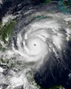 Satellite image of Hurricane Mitch over the Western Caribbean Sea with a large and well defined eye