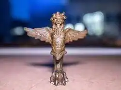 Small statue of a winged creature