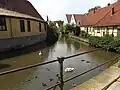 Moat with civic houses bordering on it in Steinfurt