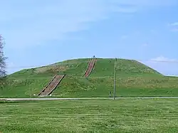 Monks Mound of Cahokia (UNESCO World Heritage Site) in summer. The concrete staircase follows the approximate course of the ancient wooden stairs.