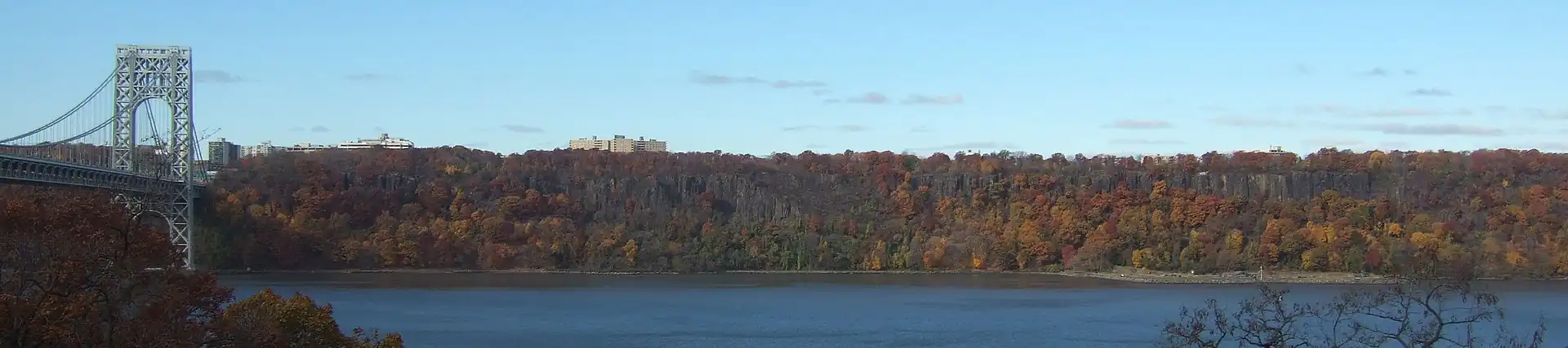 Pictured The Palisades, with the George Washington Bridge on the left. The Palisades are a line of steep cliffs along the west side of the Hudson River in Northeastern New Jersey and Southeastern New York, stretching north from Jersey City, New Jersey to Nyack, New York.