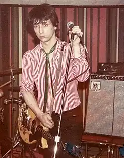 Thunders performing at the VFW Post in Ann Arbor, Michigan, in July 1979. He was then collaborating with Wayne Kramer of MC5, as Gang War.