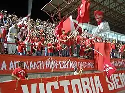 Nea Salamina Famagusta FC fans at Ammochostos Epistrofi Stadium in a game against AEP Paphos FC in season 2006–07.