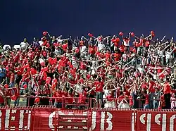 Nea Salamina Famagusta FC fans at Ammochostos Epistrofi Stadium in a game against AEK Larnaca FC in season 2009–10.