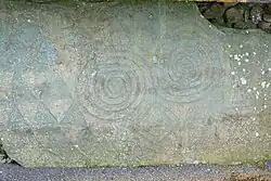 Spiral and Lozenge shapes on outer kerbstone