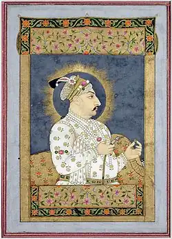 A color portrait of a mustached turbaned man in royal dress