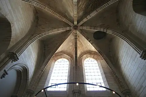 Circular utility door (right of center) in the ceiling below the north tower made for raising and lowering bells[154]