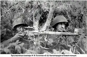 Famous Soviet sniper duo Fyodor Okhlopkov and Vasilij Kvachantiradze use a Mosin-Nagant sniper rifle with PU scope