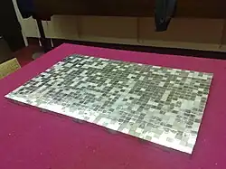 1,000 cubic centimeters of 99.9% pure platinum, worth about US$696,000 as of 29 Jun 2016 ($911,884 adjusted for inflation)[105]