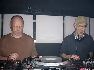 The duo behind a record table