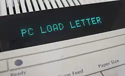 "PC LOAD LETTER" in a printer console's LED display.