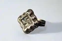 Pagan Lithuanian 13th–14th century ring with a swastika found in Kernavė. The swastika has historically been widely used in Lithuanian jewelry among other objects.
