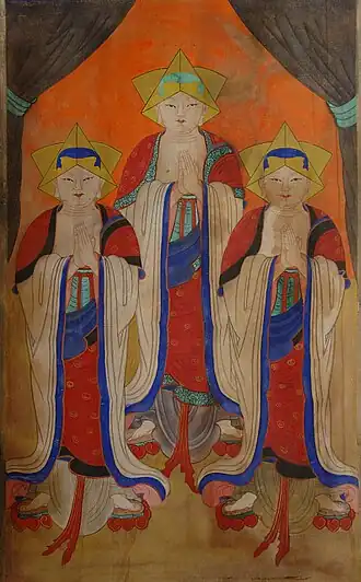 Painting of 3 Asian people facing front, orange background.